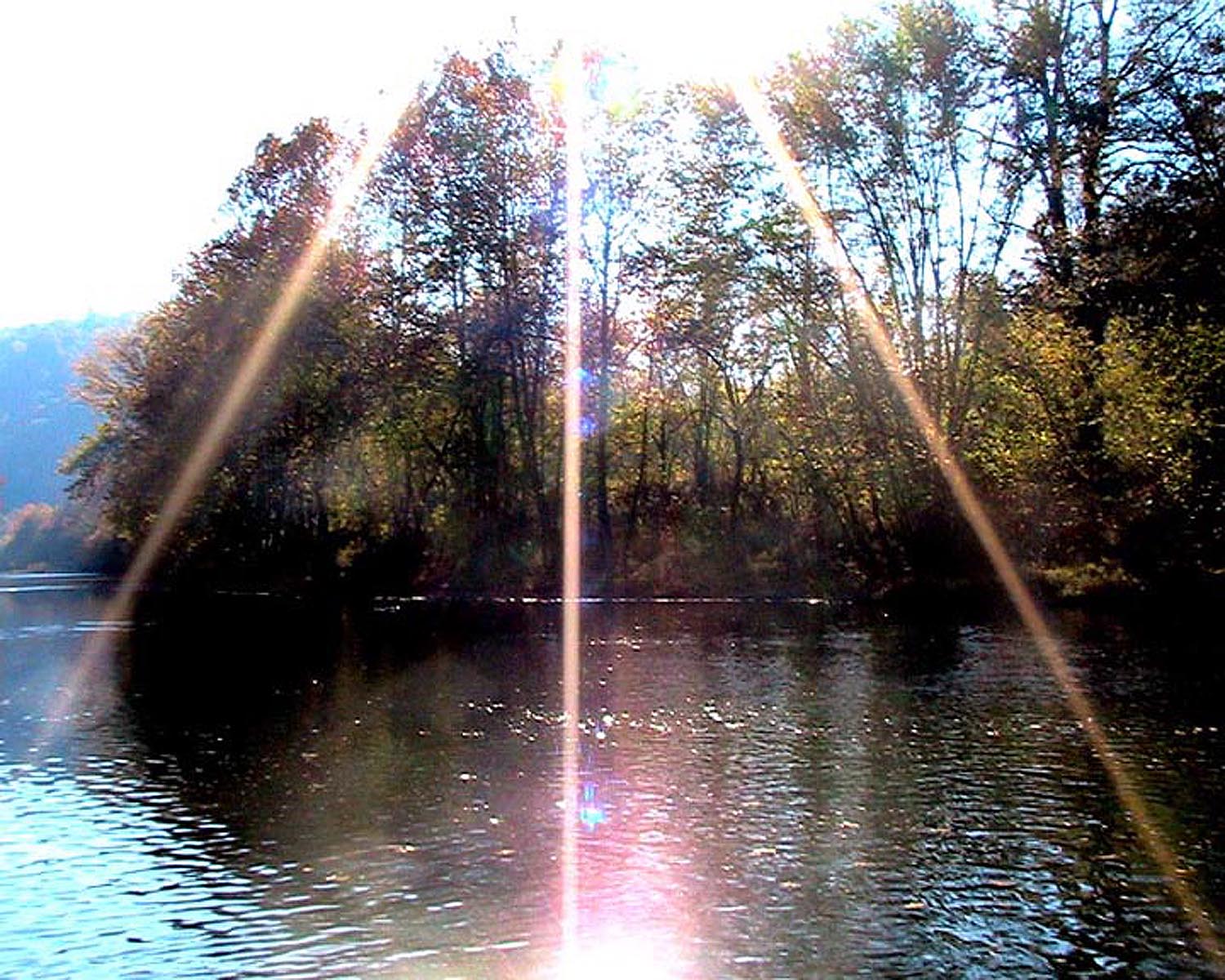 sunburst over river