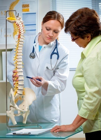 chiropractor specialist doctor diagnosing